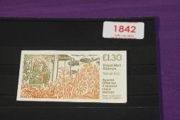 GB 1986 £1.30 BOOKLET WITH ERROR DOCTOR BLADE FLAW, CYLINDER B36 Complete £1.30 booklet (selvedge to