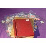 WORLD STAMP COLLECTION IN 2 ALBUMS INC C/W, PLATED GB REDS + LOOSE Small springback album with