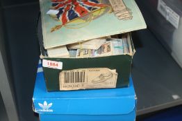 COLLECTION OF CIGARETTE CARDS, HOUSED IN TWO OLD SHOE BOXES Two old shoe boxes, along with loose