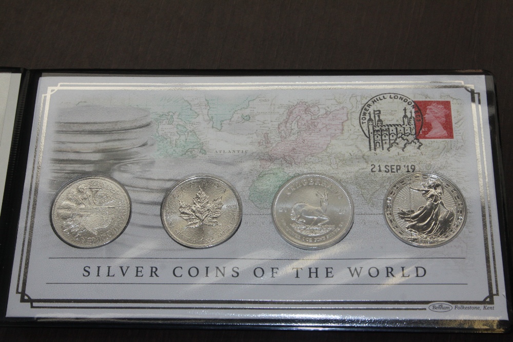 2019 SILVER COINS OF THE WORLD NUMIMATIC COVER WITH 4 x SILVER COINS