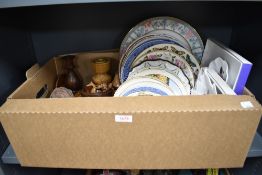 A small collection of treen items including mushrooms, candlesticks and a lidded pot and a selection