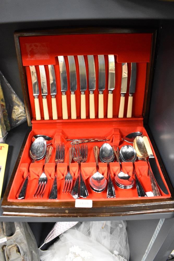 A 20th Century canteen of Priestley & Moore of Sheffield cutlery, with ivorine and other handles