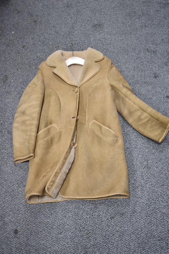 A three quarter length ladies sheepskin jacket 22inch chest size approx.