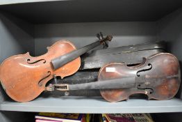 Two antique violins and cases with one bow all as found