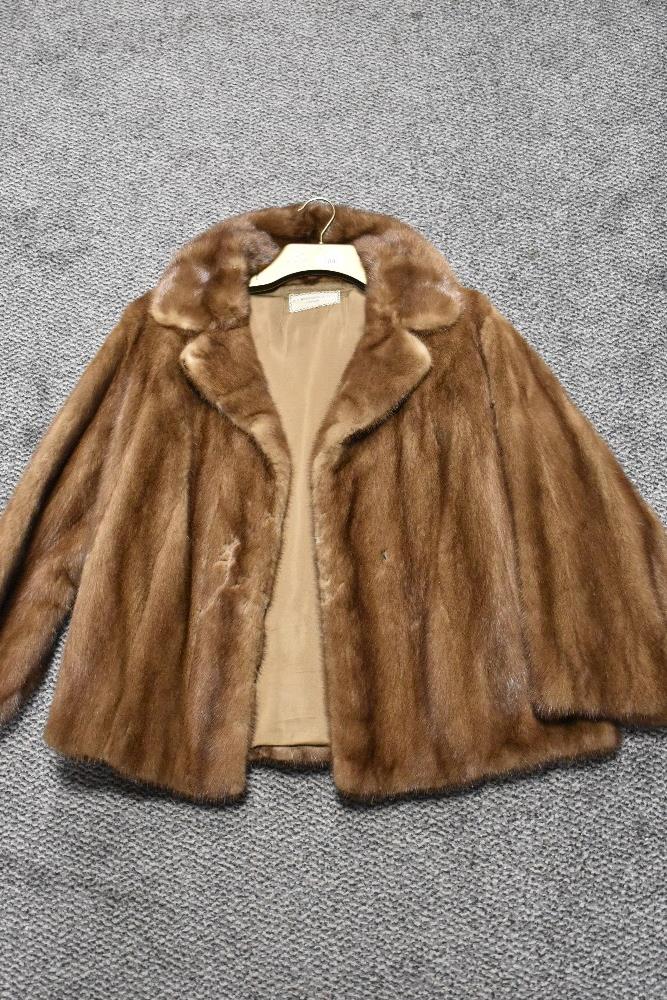 A vintage caramel mink jacket having 'M J L' monogrammed to lining.