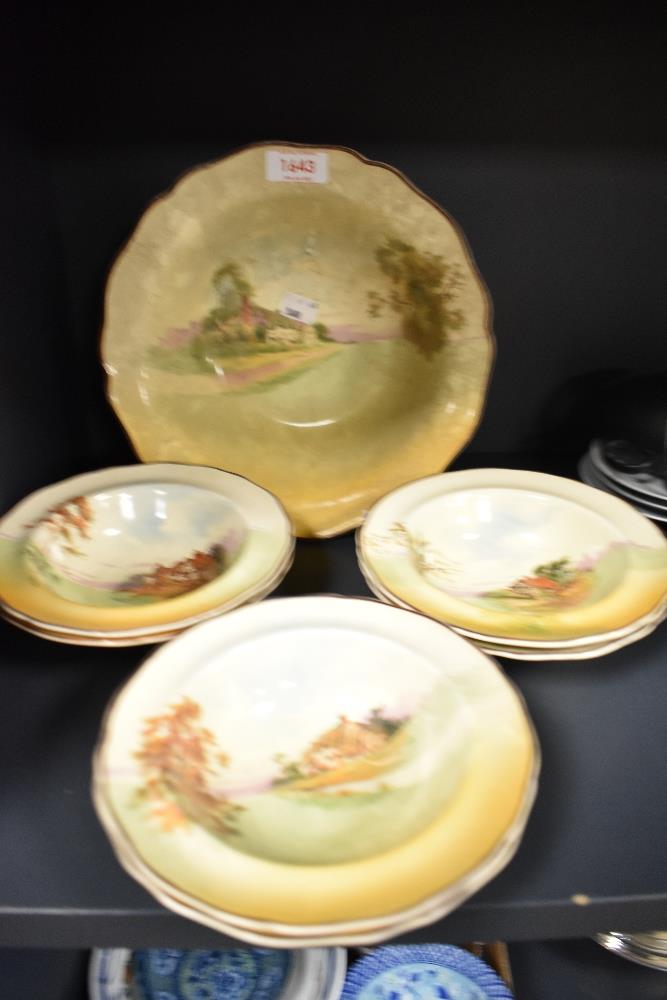 A selection of Royal Doulton bowls, having various count4ry cottage designs to centres.