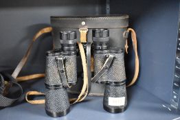 A pair of vintage Brisgovia binoculars with case.