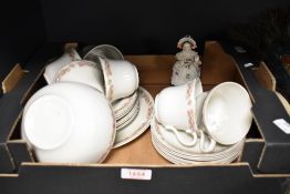 A part tea service in white with pink floral swag design (20 pieces approx) and a vintage Dresden