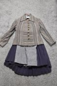 A vintage Windsmoor skirt suit and three skirts, including 1950s blue and grey herringbone and