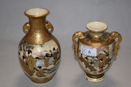 Two 20th century Japanese Satsuma vases, both having handles and extensive gild heightening.