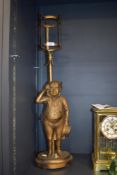 A gilt painted metal table lamp, modelled as Mr Pickwick, 'Made In England', Rd. 798010, measuring