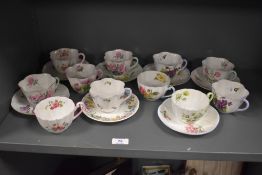 A Shelley Celandine patterned tea set comprising seven teacups and saucers plus four spare teacups
