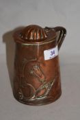 A 19th Century Joseph Sankey & Sons copper lidded jug, of Art Nouveau design, and measuring 13cm