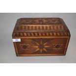 A 19th Century marquetry inlaid jewellery box, decorated with Eastern motifs, and having a fitted