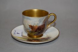 A Royal Worcester porcelain cabinet cup and saucer, hand decorated with Highland Cattle, and