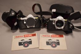 Two vintage cased Pentax ME Super cameras