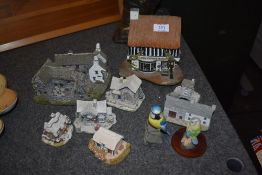 A collection of Lilliput Lane studies, including Langdale cottage, Troutbeck farm and Borrowdale