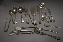 A small quantity of silver plated flatware, knives, forks, and spoons