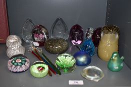 An assorted collection of glass dump weights and ornaments, to include a Wedgwood glass owl