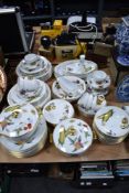 A large lot of Royal Worcester 'Evesham' table ware, including tureens, plates, bowls and cups and