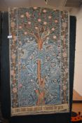 A tapestry wall hanging, having verse and depiction of fruit tree and birds.