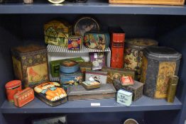 An assorted collection of novelty enamelled confectionary and other tins, to include an Ogden's