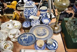 A mixed lot of blue and white ware, including antique plates, jug and beaker and a 20th century