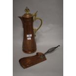 A 19th Century copper and brass lidded ewer, of Art Nouveau design, the body decorated with a