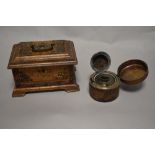 A 20th century oak lidded jewellery box with metal mounts and an inkwell