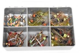 A pocket box containing approximately 70 fishing flies. Gold beaded montanas and Large midge