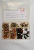A pocket box containing approx 50 fishing flies. Montanas and Prince nymph in different colours