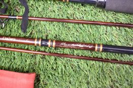 2 Daiwa 2 pc carbon fishing rods in original soft sleeves A 7ft Procaster pl13 and an 8ft