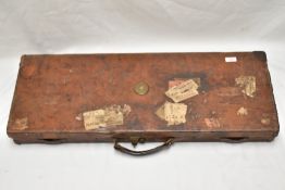 A Leather gun case measuring 83cm x 31cm x 8cm Having an internal Label marked Holland and Holland