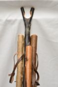 Six very sturdy wooden walking sticks approx 127cm long with leather straps and one is an unusual