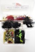 Two boxes of fishing flies containing approximately 70 flies. Mixed Fitz and mixed Lures