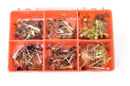 A pocket box containing approximately 90 fishing flies. Damsel nymphs and Prince nymphs