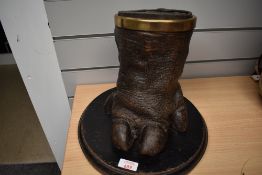 A Victorian taxidermy Hippopotamus Hippo foot mounted on a black circular wooden plinth with thick