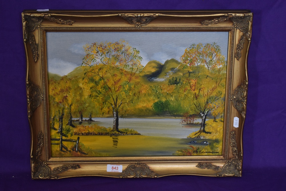 M. Edmondson (20th Century, British), oil on canvas, 'Autumn in Lakeland', a naive and vibrantly - Image 2 of 4