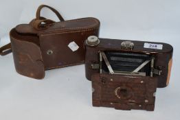 A Hawkette No2 bakelite folding camera in a leather case