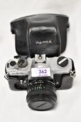 A Fujica ST605N camera with Fujinon 1:2,2 55mm lens