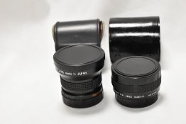 Two lenses. A Sunactinon telephoto for video cameas, and a Seimar-Super wide/semi fish eye