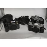 Four Asahi Pentax camera bodies. A Pentax A3 No3361411, a Pentax K1000 No6729236, a Pentax K2