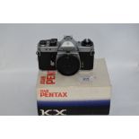 An Asahi Pentax KX camera body in original box