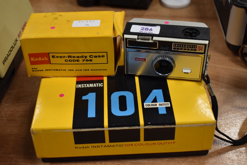 A Kodak Instamatic 104 in original box with Ever-ready soft case