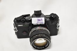 An Olympus OM-2 Spot/Program camera with OM-System G.Zuiko Auto1:1,4 50mm lens