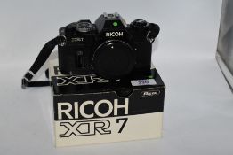 A Ricoh XR7 camera body in original box