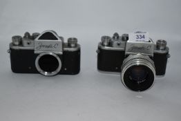 Two Zenit C camera bodies Nos 60010810 & 60287168 one with Helios-44 2/58 lens