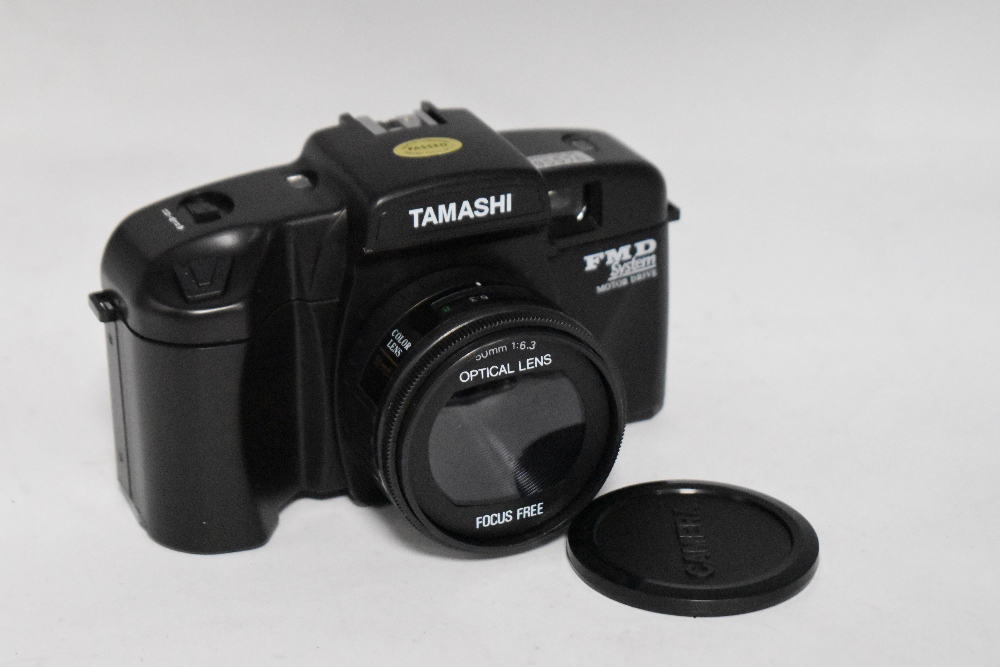 A Tamashi FMD camera with 50mm 1:6,3 lens and tripod flashgun in alloy case new and unused - Image 2 of 2