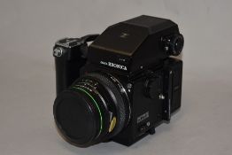 A Zenza Bronica 120 TTRS camera with Zenzanon EII 1:2,8 75mm lens, a Zenzanon MC 1:3,5 150mm lens