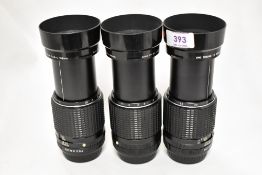 Three SMC Pentax-M Macro 1:4 100mm lenses. Nos 6005449, 6854351 & 7269710